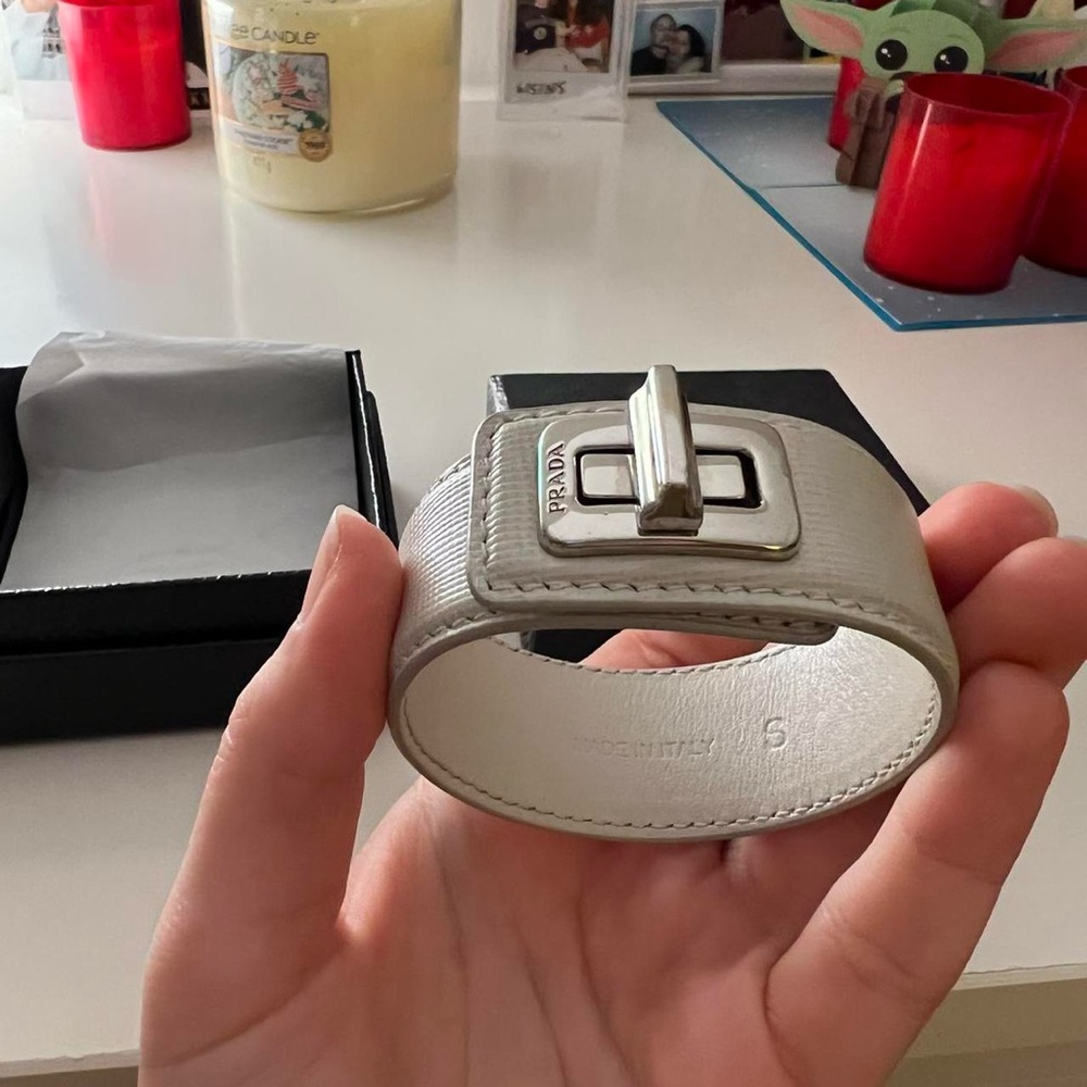 PRADA saffiano leather cuff bracelet in off white